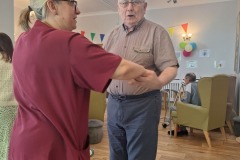 Singing and dancing at Charnley House care home in Hyde