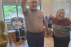 Singing and dancing at Charnley House care home in Hyde