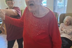 Singing and dancing at Charnley House care home in Hyde