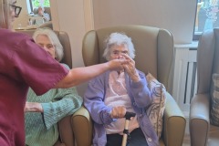 Singing and dancing at Charnley House care home in Hyde