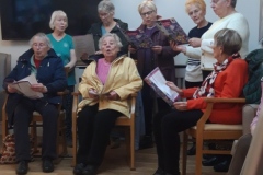 Carols and carol singers at Charnley House care home in Hyde