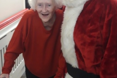 A visit from Father Christmas at Charnley House nursing home in Hyde