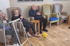 Playing softball at care home in Hyde