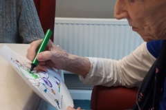 Colouring for the nursery rhyme wall at Charnley House care home in Hyde