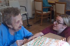 Birthday celebrations at care home in Hyde