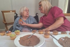 Cake decorating at Charnley House care home in Hyde