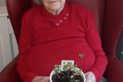potting plants at Charnley House nursing home in Hyde