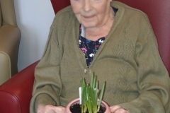 potting plants at Charnley House nursing home in Hyde