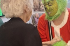 The Grinch comes to visit Charnley House care home in Hyde, Greater Manchester