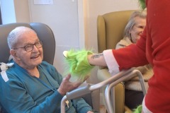 The Grinch comes to visit Charnley House care home in Hyde, Greater Manchester