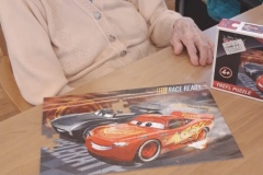 Doing jigsaws at Charnley House residential care home in Hyde