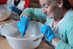 Making Cornflake cakes at care home in Hyde