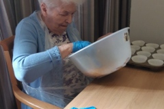 Making Cornflake cakes at care home in Hyde